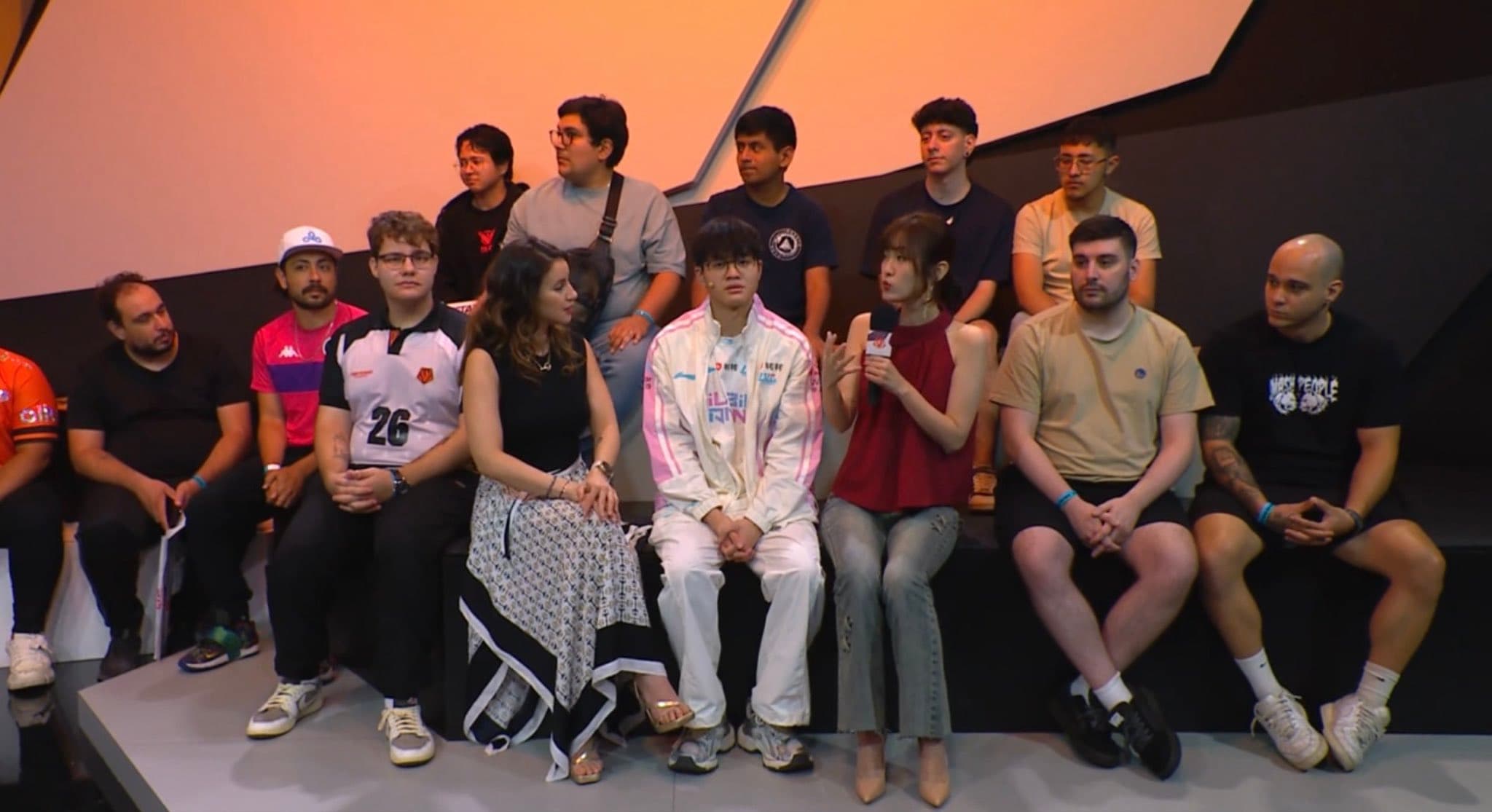 Bernardo Gomes at a Riot Games tournament event alongside international casters and players